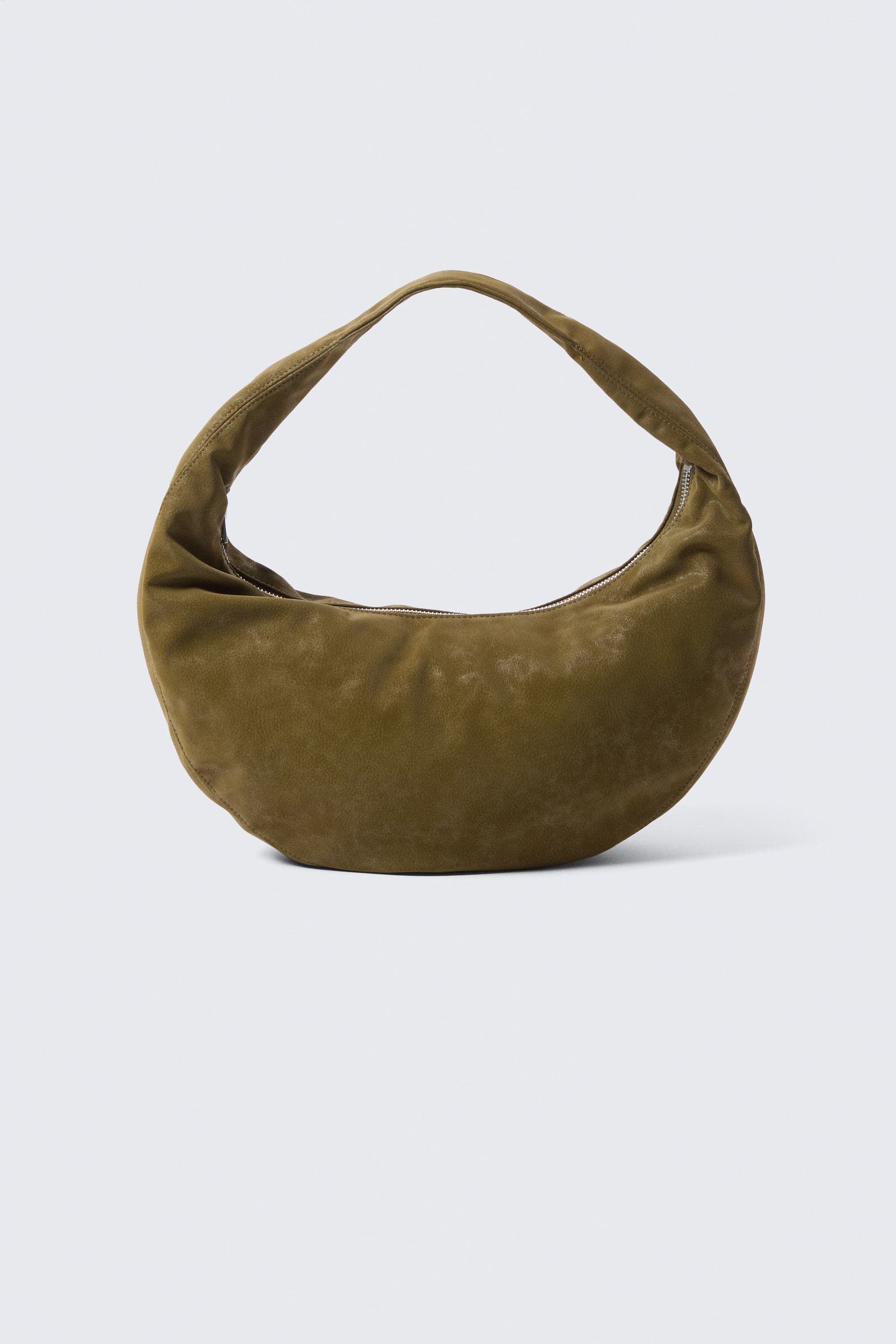 Mellomstor skulderveske med avrundet design